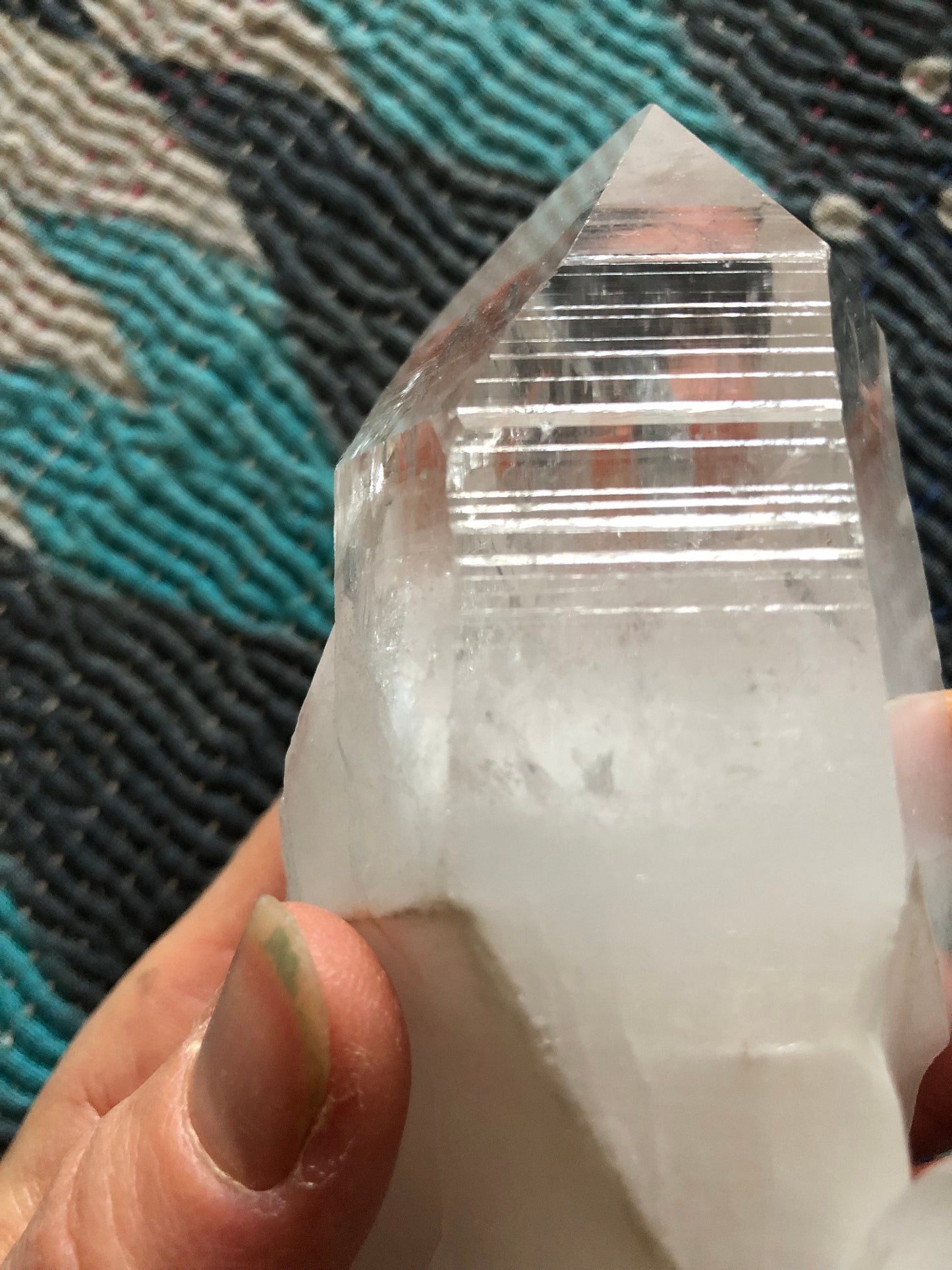 Brazilian quartz point with beautiful clarity and growth lines.