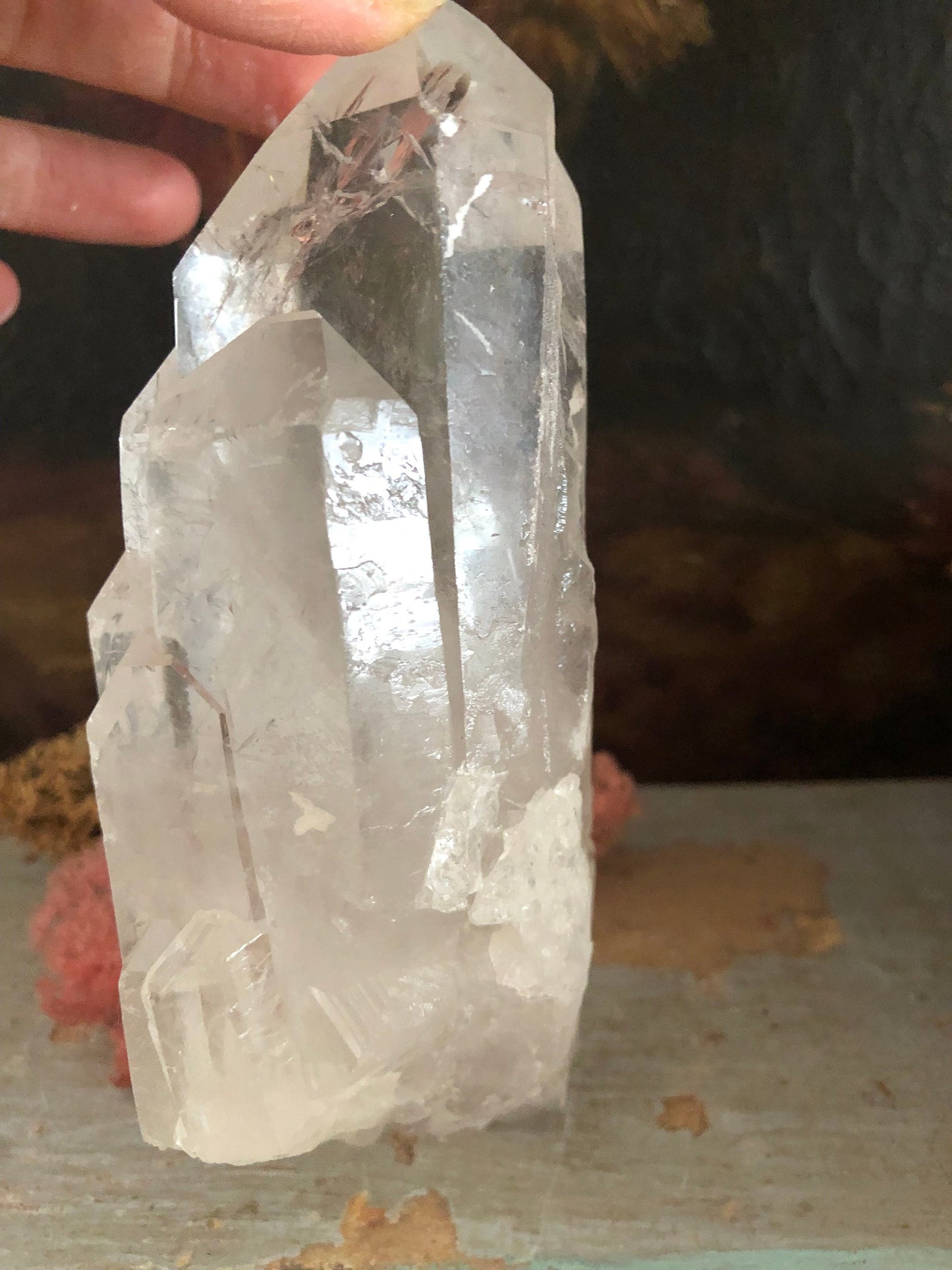 Quartz point with 7 smaller points (dolphin) rainbows.