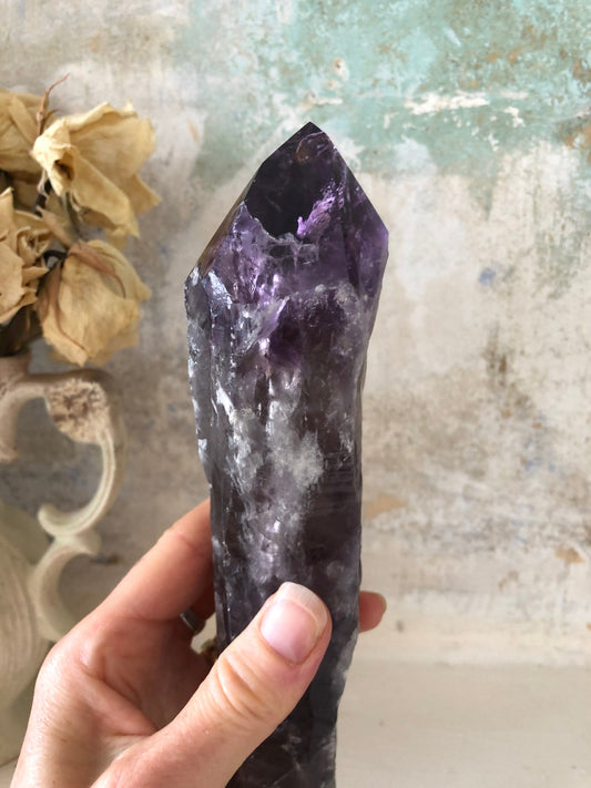 Large Amethyst dog tooth flame/point.